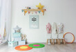 © New Africa - Stylish playroom with toys and furniture in kindergarten. Interior design
