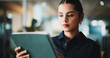 © peopleimages.com - Journalist, reading or woman with tablet in creative agency, check publication app or online newspaper. Review article, source verification or reporter research with tech, story or feature evaluation