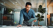 © BuyOutFelix06/peopleimages.com - Finance, review or man in office with tablet, funding ideas or data analysis for budget pitch. Research, paper and analyst in workplace with tech, online report or proposal update for investment plan