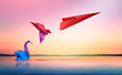 © freshidea - Succeed And Transform or Success transformation and improving as a leadership in business through innovation and evolution concept with paper origami changed for the better.