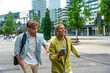 © unai - Diverse colleagues walking together in city business district