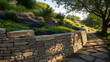 © THIBNH - Sturdy dry-stack stone retaining wall lining a sloped garden path highlighting structural course craftsmanship and erosion control in a backyard landscape design featuring natural rock masonry.