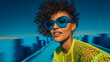 © _Dmitrich_G - Stylish portrait of woman wearing blue sunglasses on dynamic background with motion blur and vibrant fashion