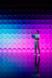 © Rendara Studio - Man working with neon 3D tech glass circles background