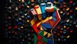 © Matteo - a dynamic mosaic of a raised fist made of colored geometric pieces symbolizing unity and solidarity for black history month and african american heritage