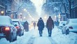 © photostockatinat - A snowy day in the city with people walking on the road, covered in snow