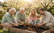 © Stamplovesink - Multi-generation family gardening together in backyard raised bed