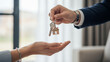 © Erlangga - Handing Over House Keys – Real Estate Deal Closing and New Home Property Ownership Concept