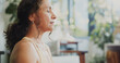 © peopleimages.com - Calm woman, meditation and home with breathing exercise for spiritual wellness or health. Female person, yogi or relax with inner peace or zen for mindfulness, awareness or mental wellbeing on space