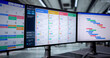 © Andrey Popov - Productivity Expert Utilizes Multiple Screens On Desk
