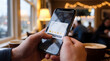 © Rubina - hands holding smartphone, customer giving five star rating review, cafe shop background, mobile app feedback, satisfaction service concept, for business, marketing, technology.