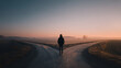© Broccolini - Minimalist conceptual photography of a silhouette standing at a forked road during a misty sunrise, representing decision-making, new beginnings, and the journey of life