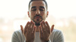 © Kabel - Man Praying with Hands Together Calmly.