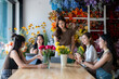 © Wasana - Florist teaching flower arranging workshop to women