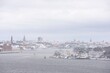 © a40757se - Winter view of Stockholm, Sweden.Old City. Old ferryboats on Lake Mälaren in the foreground