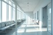 © miss irine - Spacious modern hospital waiting area. Bright, clean clinic corridor features multiple rows of empty white chairs. Large windows provide natural light, illuminating sterile white walls, polished