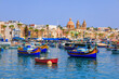 © Carmen - Traditional fishing boats in the Mediterranean Village of Marsaxlokk, Malta
