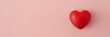 © Shahida - A large red heart on a soft pink background for Valentines Day or love concepts