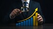© fatema202 - Businessman analyzing bar graph with magnifying glass showing growth trend