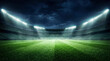 © Juliaap - Empty sports stadium at night with pristine green turf and towering floodlights casting dramatic light across stands, evoking anticipation and readiness for a big match or event