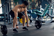 © Prostock-studio - Shirtless Arab Man Making Deadlift Workout At Modern Gym Interior, Young Muscular Middle Eastern Guy Lifting Heavy Barbell While Training At Sport Club, Enjoying Bodybuilding Exercises, Closeup Shot