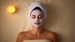 © JPminimal - Relaxing spa day woman with face mask tranquil setting beauty treatment serenity close-up view