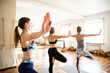 © Maria - Yoga Class, Group of People Relaxing and Doing Yoga pose. Wellness and Healthy Lifestyle.