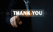 © wasan - Businessman pressing virtual thank you button on digital interface, showing appreciation, gratitude, customer service, business communication, technology concept with copy space on dark background.