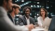 © forenna - An international team around a modern glass table with laptops and notepads, animated discussion and shared documents showing collaboration during a strategic business meeting at a bright office.