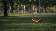 © TheWaterMeloonProjec - Vacant playground swing serving as an editorial header background in outdoor recreational areas, urban density