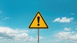 © TheWaterMeloonProjec - Traffic sign alert against a backdrop of sky with clouds highlighting hazard and caution, road safety