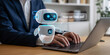 © DreamyDesignsCo - Businessman interacting with AI robot on laptop in modern office