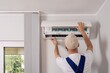 © brizmaker - Expert maintenance service for air conditioning unit in residential apartment