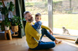 © Halfpoint - Father with little toddler son at home.