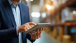 © Kateryna - Faceless manager holding digital tablet in warehouse inventory management  supply chain operations logistics technology distribution center professional oversight