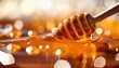 © Amy - the honey dipper resting in glowing amber honey with soft bokeh lights