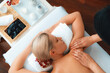 © InfiniteFlow - Panorama top view woman customer enjoying relaxing anti-stress spa massage and pampering with beauty skin recreation leisure in day light ambient salon spa at luxury resort or hotel. Quiescent