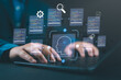 © Nirusmee - Programmer using AI coding tools on a laptop to assist software development, automate tasks, and generate code efficiently for creating modern applications.