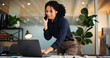 © OnPoint/peopleimages.com - Happy woman, laptop and night with phone call for proposal, deadline or negotiation in office. Female person, consultant or agent working late with computer or mobile smartphone for business advice