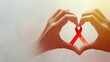 © Mi - Female hands holding red ribbon HIV, AIDS awareness ribbon, healthcare and medicine concept. retro effect.