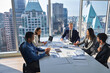 © Aashir - International happy professional business team at group office meeting.