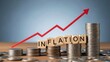 © Mim Studio - Stacks of coins and wooden blocks spelling inflation with a red upward trending graph rising prices economy
