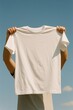 © Rawpixel.com - Blank white t-shirt skyward.