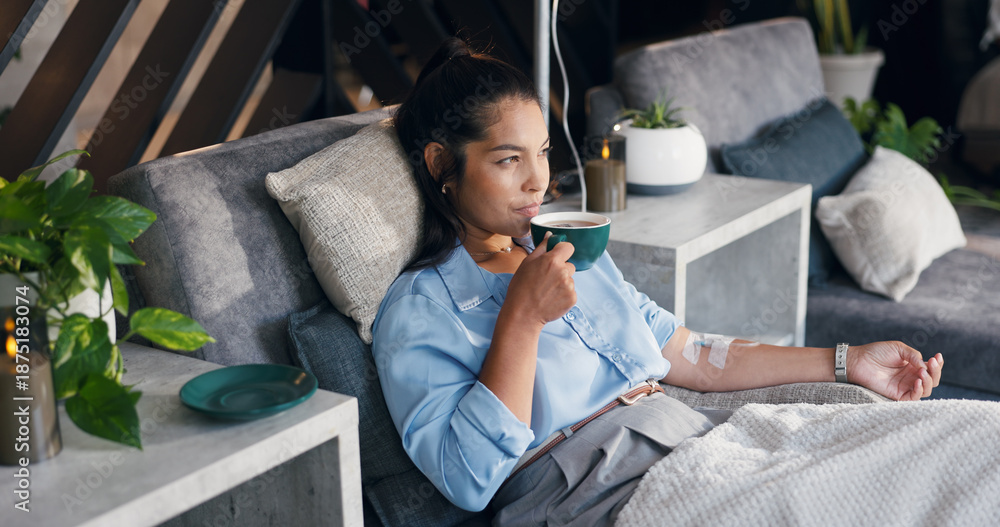 Woman, relax and tea with IV drip for vitamins, nutrition or immune booster on bed in clinic. Female person, patient or drinking with herbal beverage or blood infusion for antioxidant or wellness