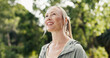 © DavidsPrime/peopleimages.com - Thinking, smile or woman in nature for fitness, fresh air or rest after physical activity. Wellness, bokeh or female person in forest with mindfulness, daydreaming or outdoor break in workout hobby.