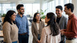 © redtiger9 - Enthusiastic indian corporate team enjoying convivial break in modern co-working hub