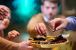 © .shock - Muslim family shares iftar in a restaurant with Ramadan decorations during the holy month together