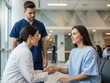 © nasima0204 - Doctor consulting with patient in hospital setting