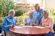 © Robert Kneschke - Senior Adults Doing Cognitive Rehabilitation Exercises With Nurse Outdoors At Rehab Center For Brain Injury Recovery And Mental Wellness Support