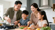 © Zucide - Diverse family cooking on home kitchen of lifestyle with joyful teamwork for advertising food and family values concept